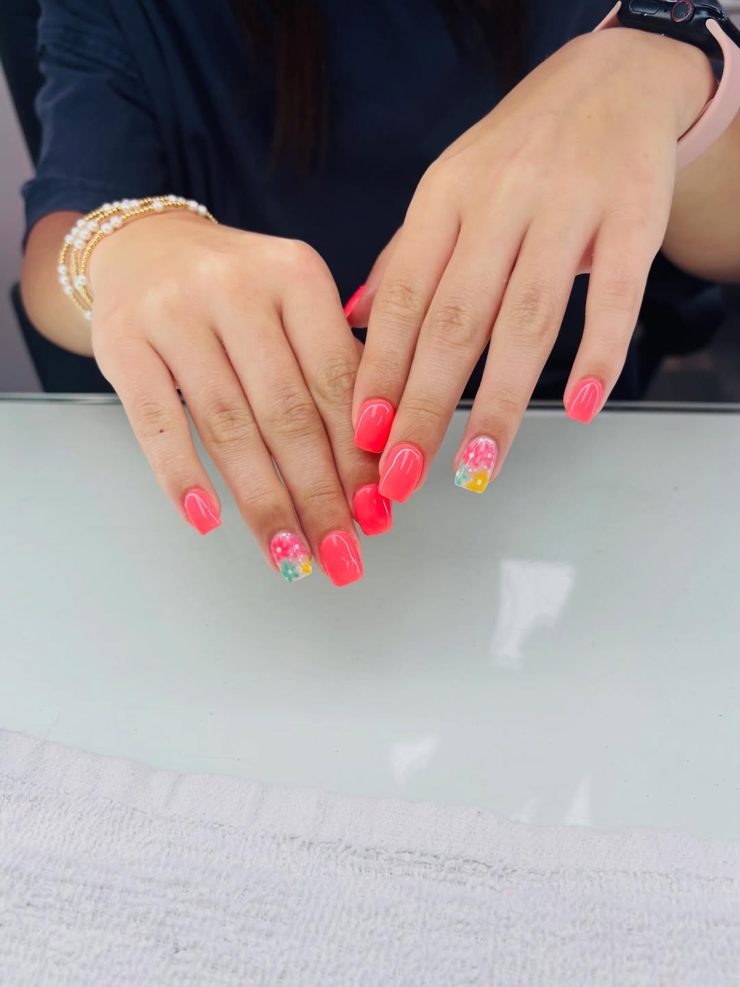 Vibrant Coral Square Nails With Floral Accents