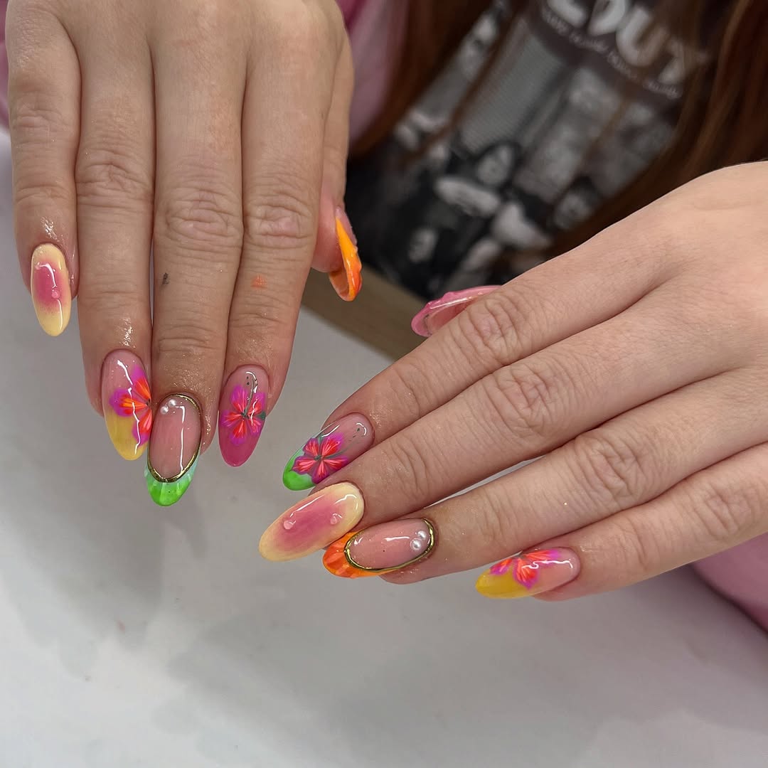 Vibrant Floral Ombré Oval Nails with 3D Accents