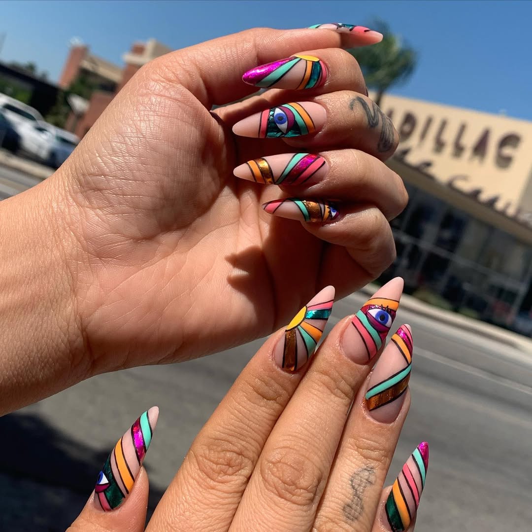 Vibrant Geometric Eye Stiletto Nails