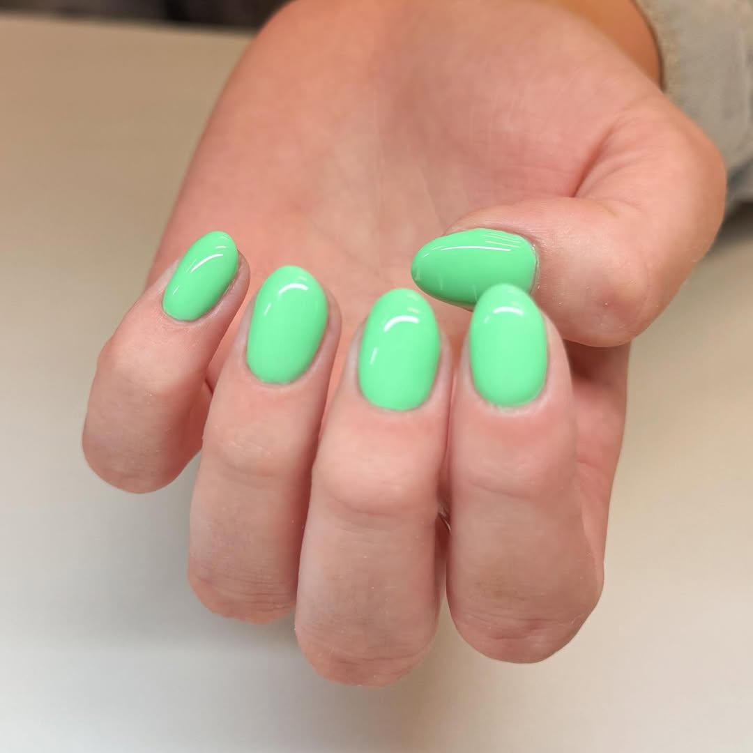 Vibrant Glossy Neon Green Oval Summer Nails
