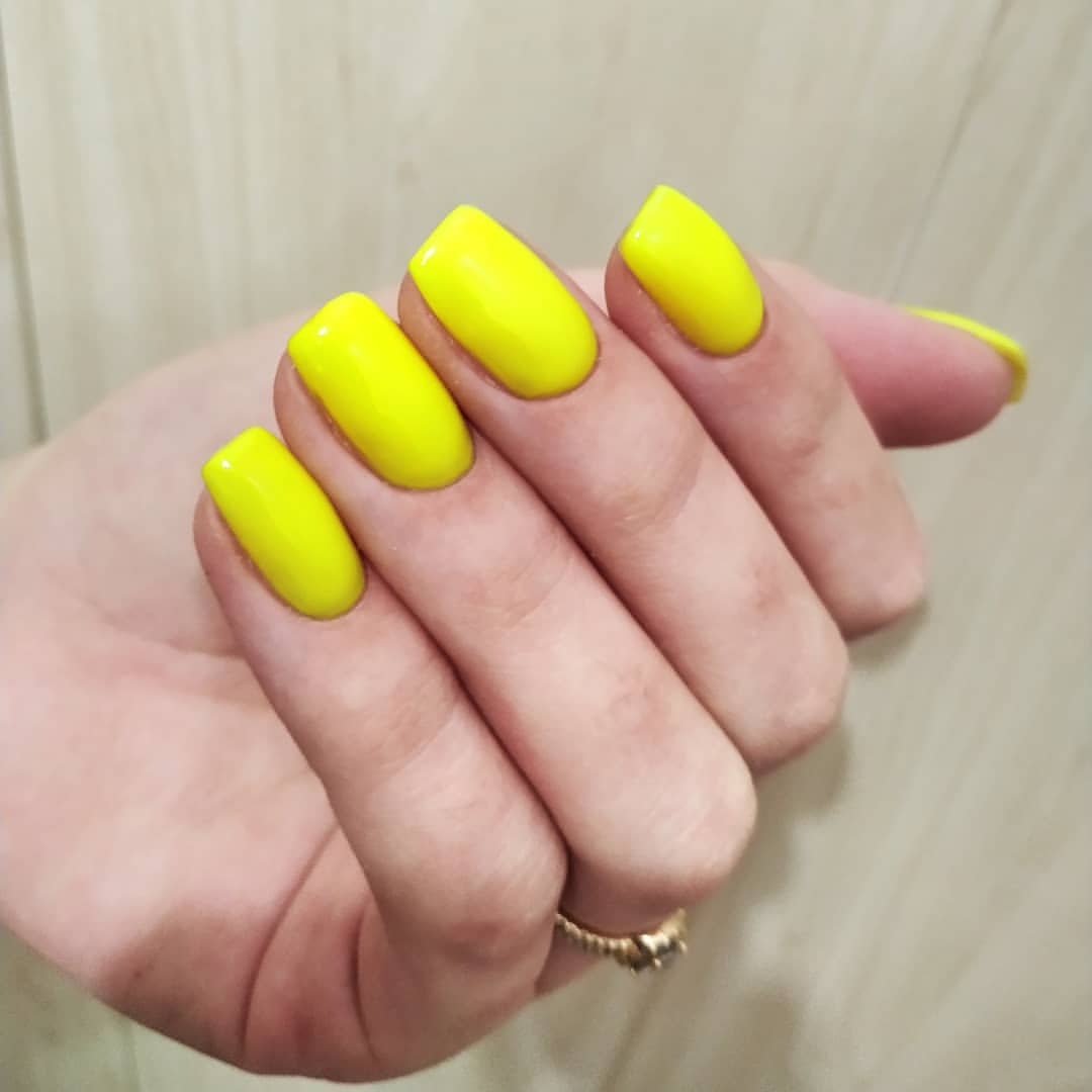 Vibrant Glossy Neon Yellow Square Nails