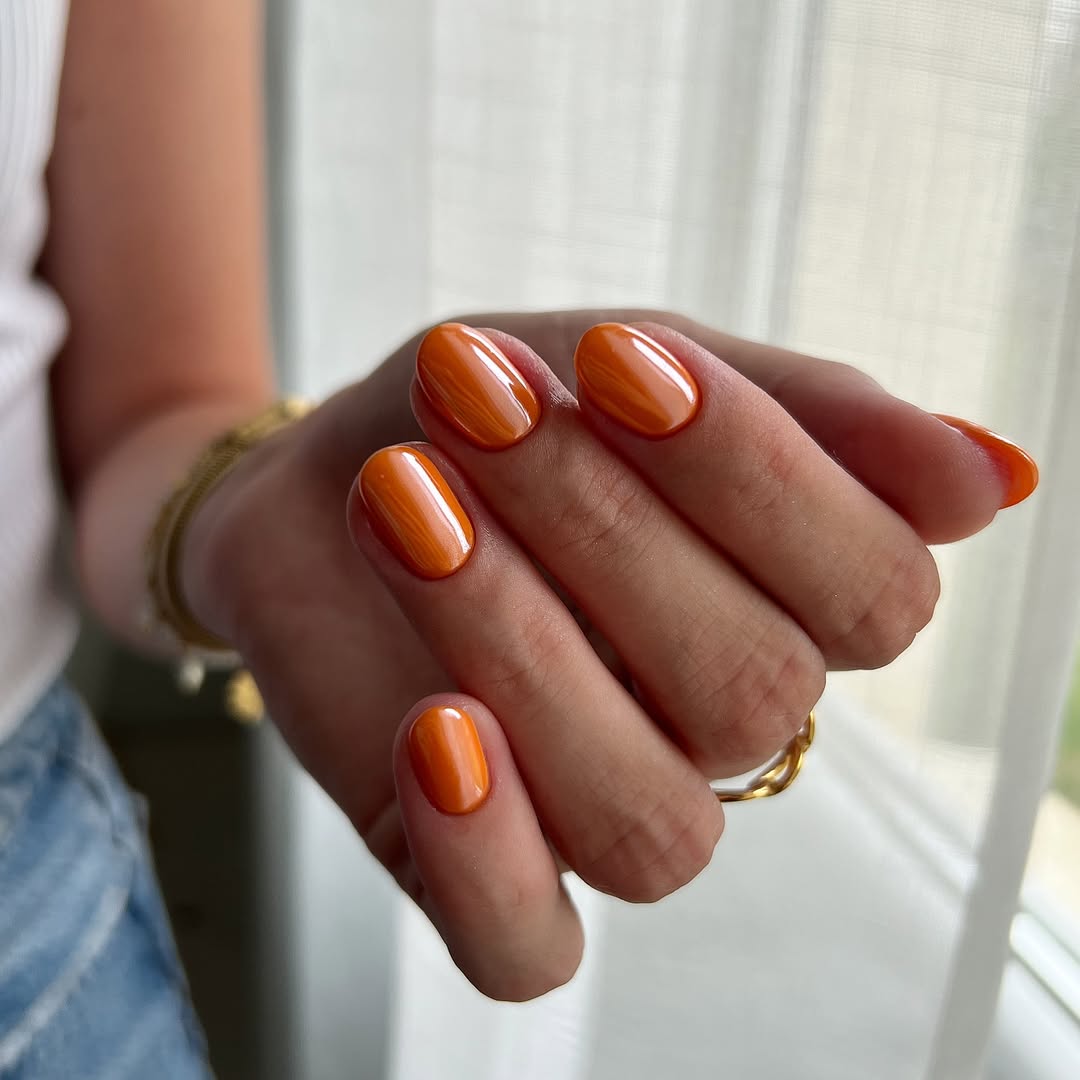 Vibrant Glossy Tangerine Summer Oval Nails