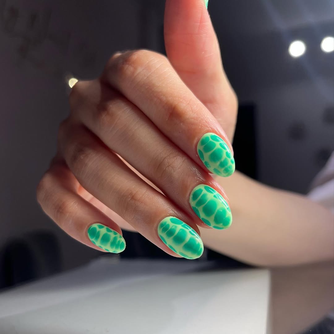 Vibrant Green Animal Print Almond Nails