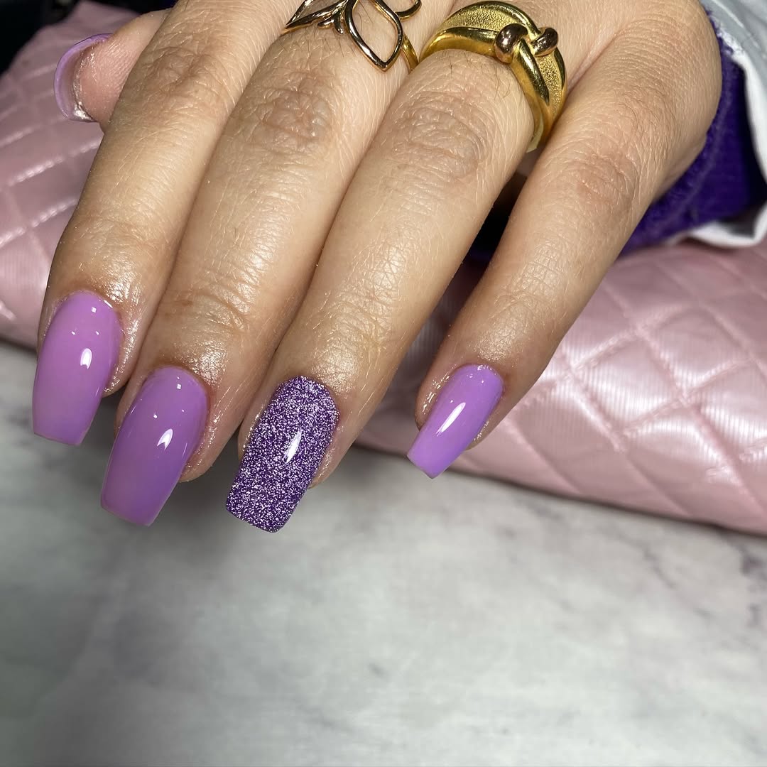 Vibrant Lilac Glossy And Glitter Accent Coffin Nails