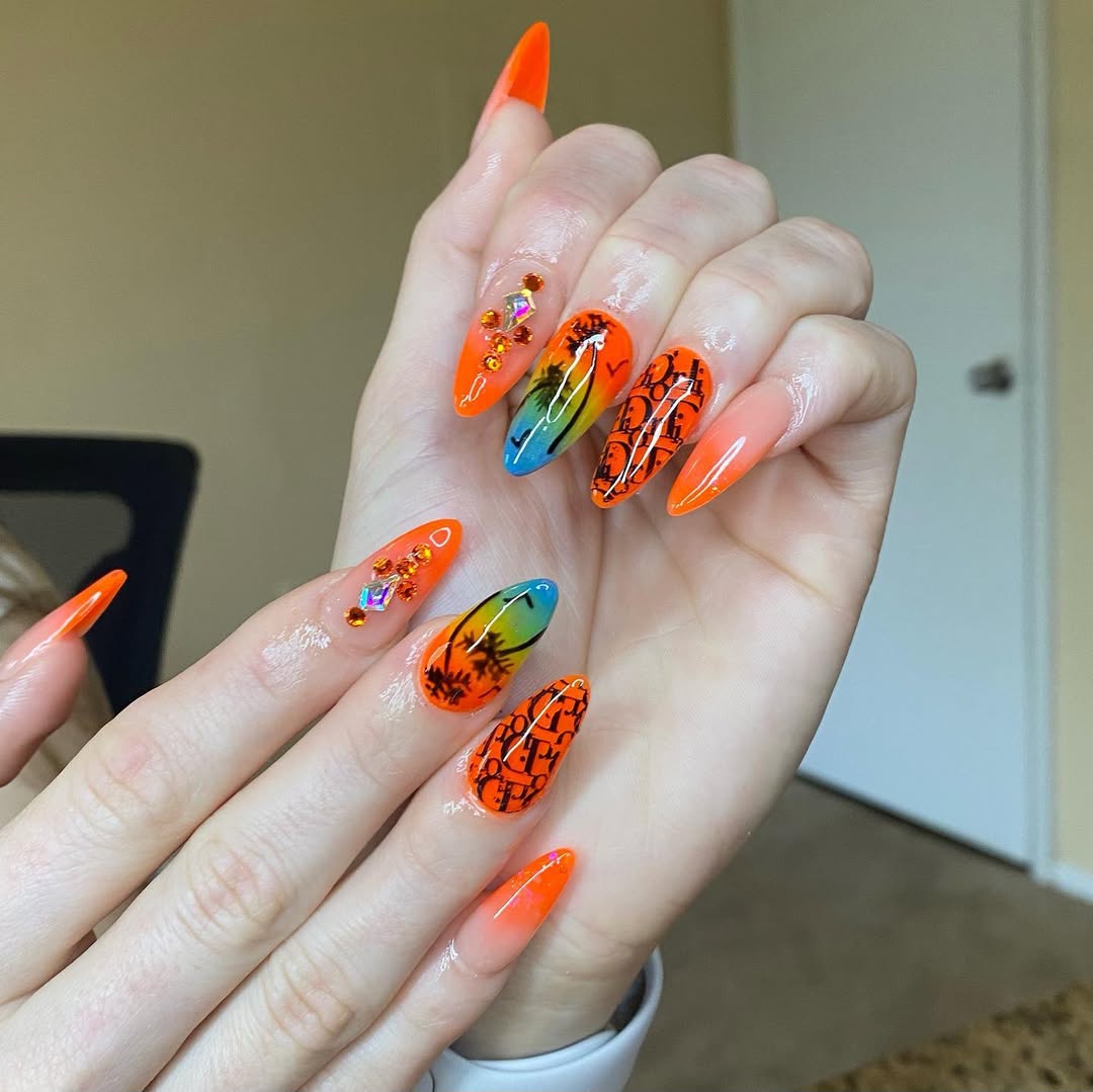 Vibrant Neon Ombré Stiletto Nails with Palm Trees and Logos