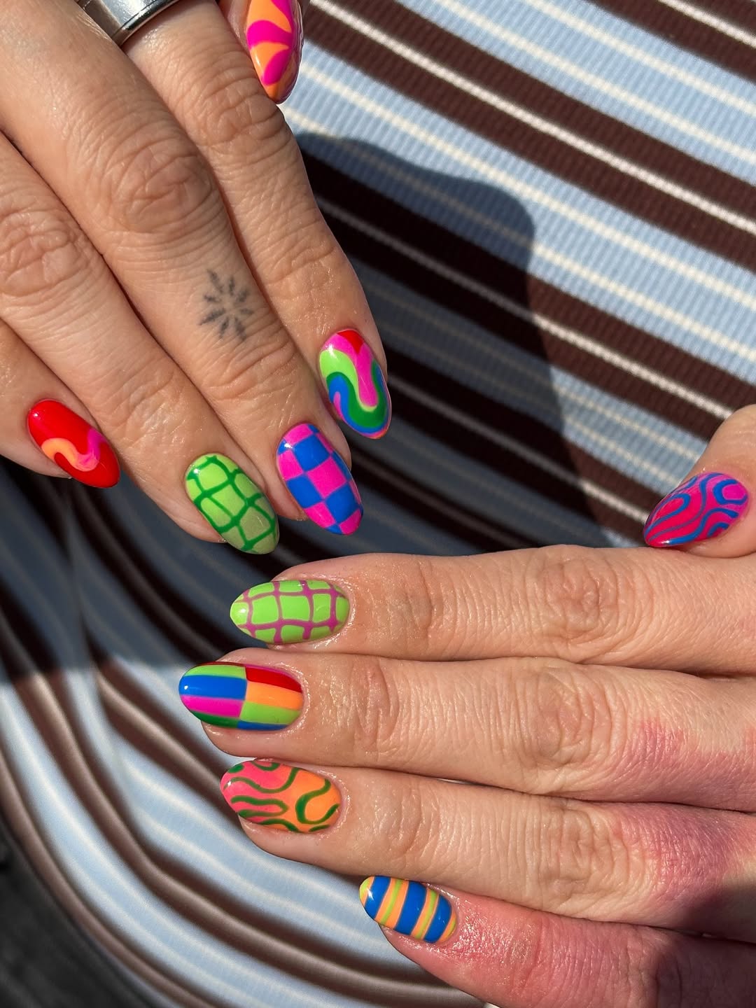 Vibrant Neon Swirls Checkerboard Stripes Jelly Nails