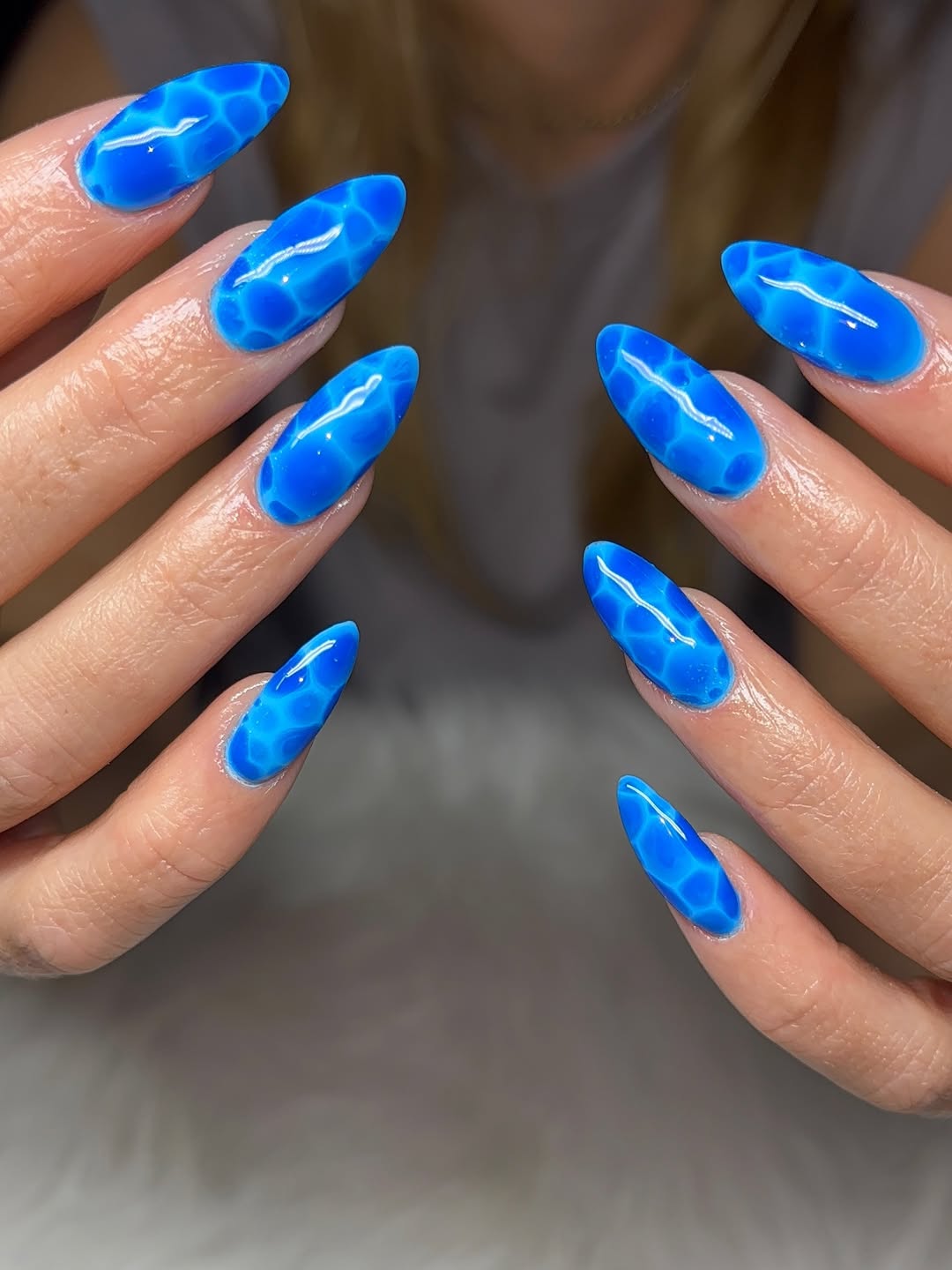 Vibrant Ocean Water Swirl Almond Nails