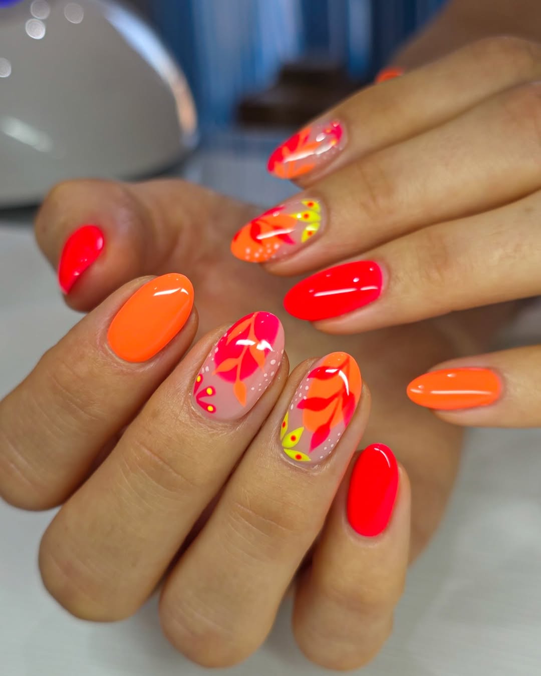 Vibrant Orange and Red Botanical Glossy Oval Nails