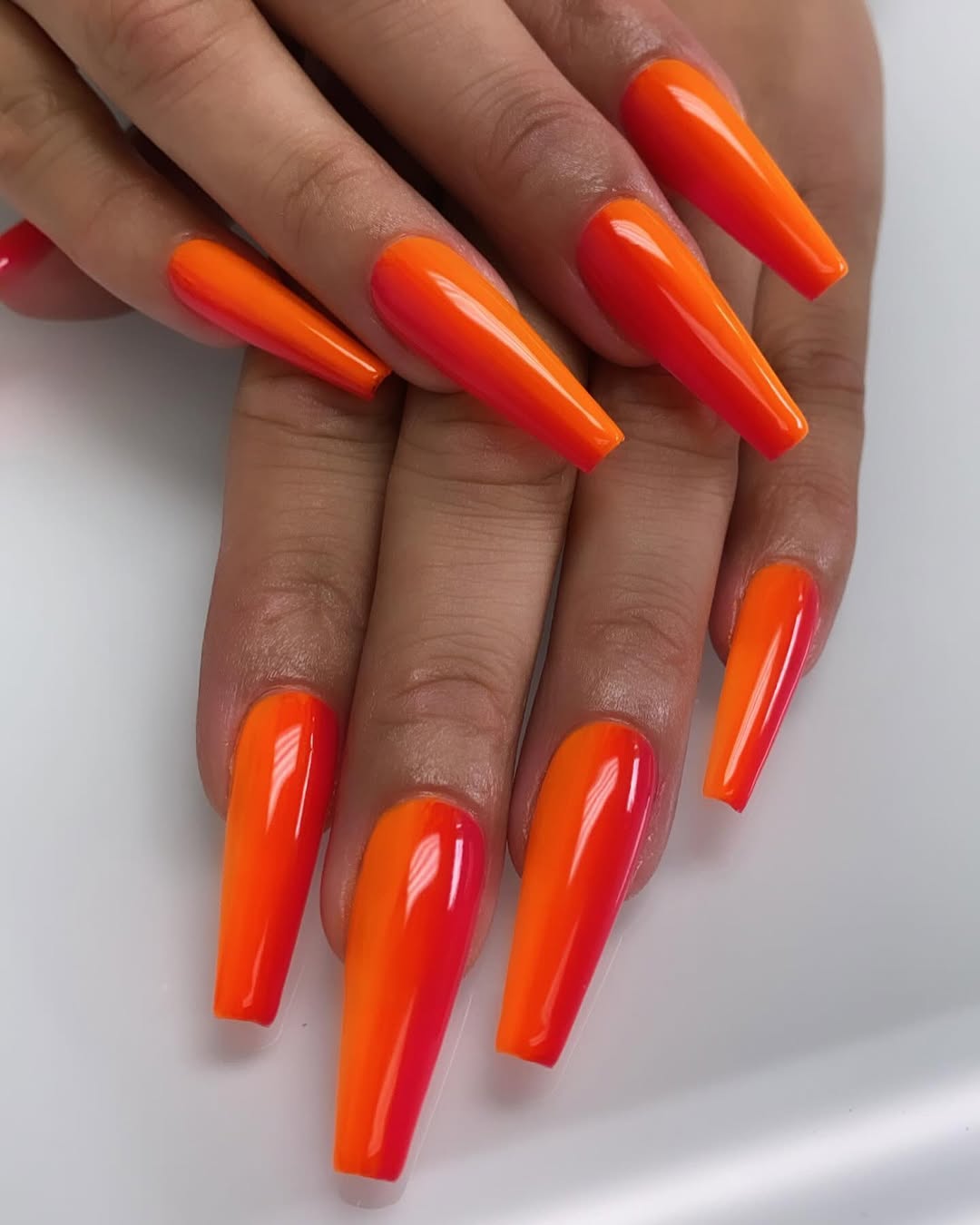 Vibrant Orange and Red Ombre Coffin Nails