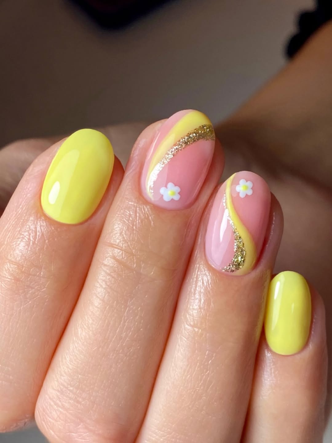 Vibrant Pastel Pink and Yellow Swirl Nails