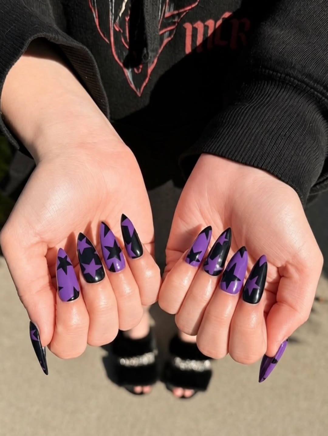 Vibrant Purple Black Stiletto Star Nails
