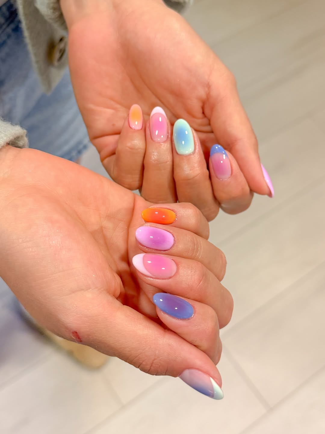 Vibrant Rainbow Cat Eye Ombre Almond Nails