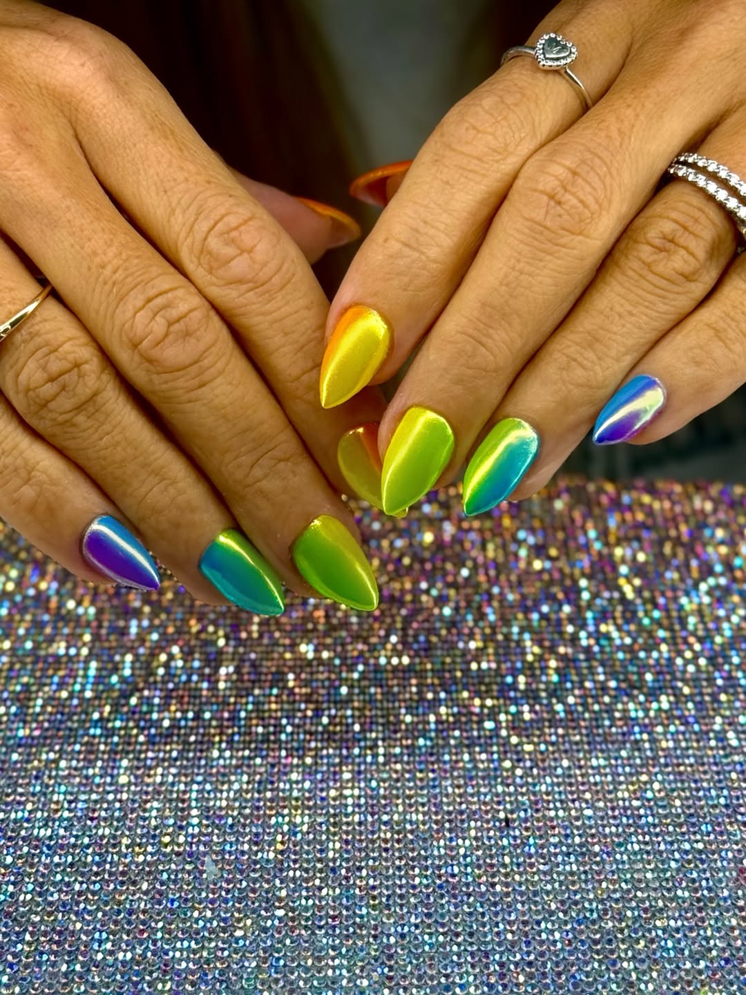 Vibrant Rainbow Chrome Stiletto Nails
