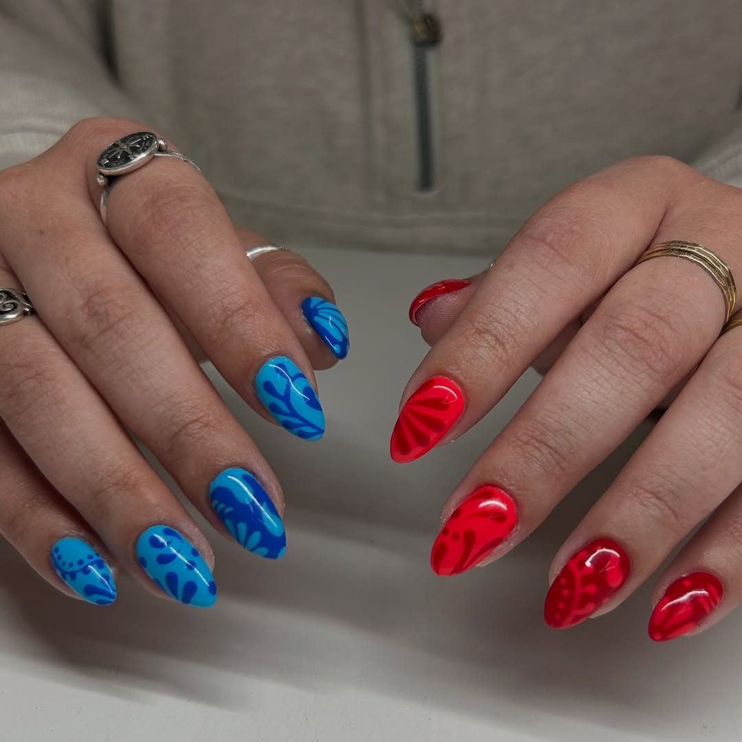 Vibrant Red and Blue Abstract Almond Nails
