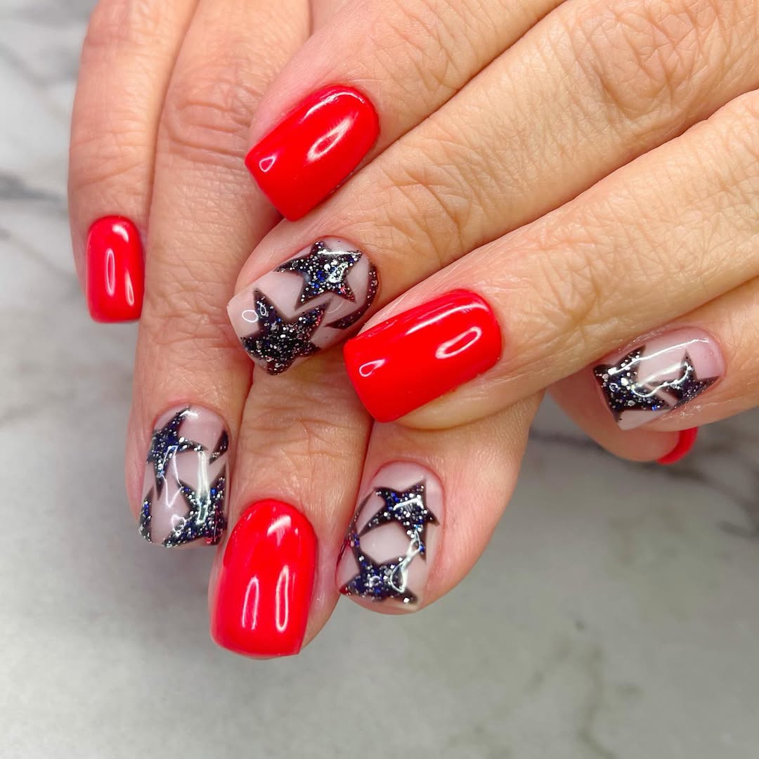 Vibrant Red and Star Glitter Squoval Nails