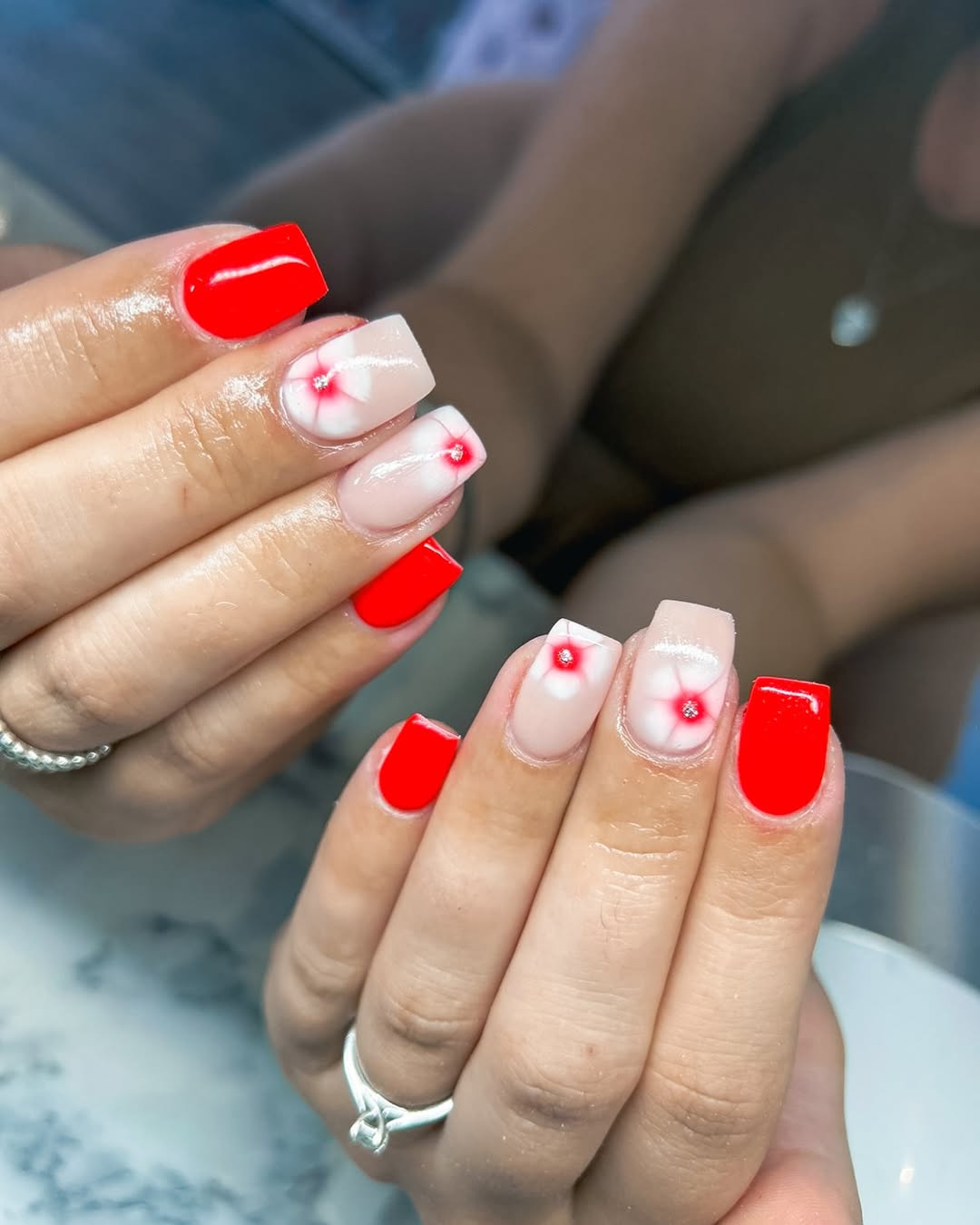 Vibrant Red Square Nails with Tiny Floral Accents