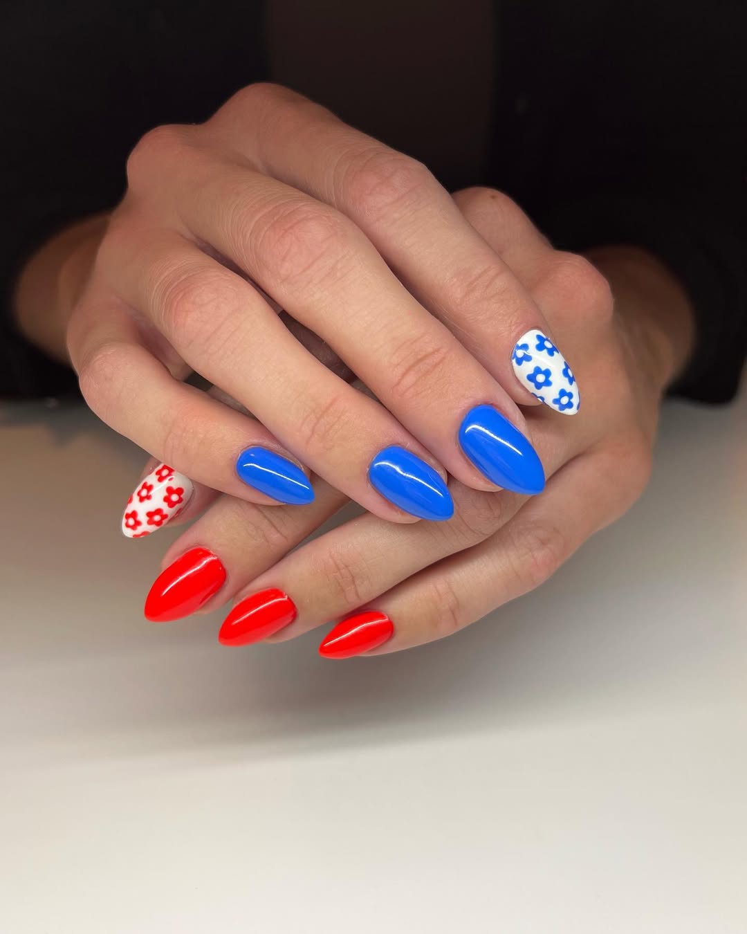 24 Red White Blue Nails You Need for 2026 3 Vibrant Red White and Blue Floral Almond Nails