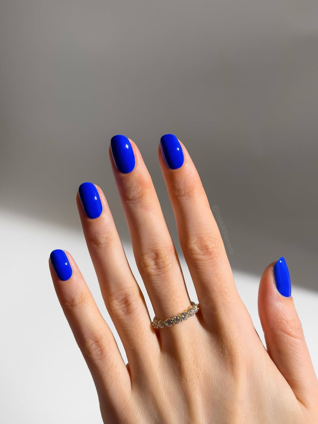 Vivid Blue Glossy Short Oval Nails