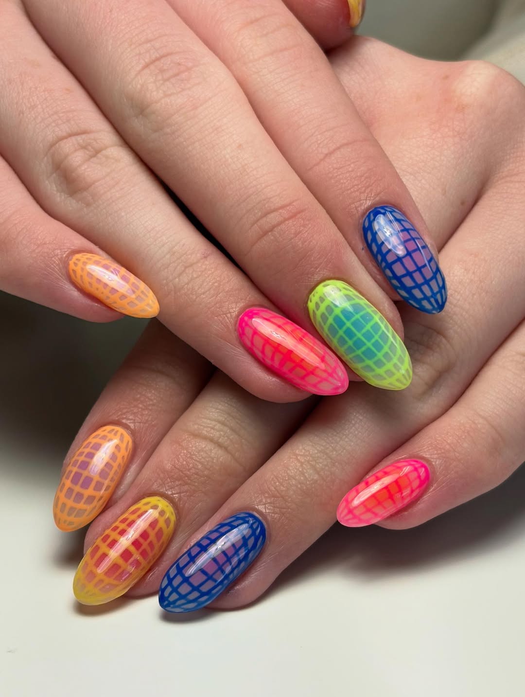Vivid Neon Grid Stiletto Vacation Nails