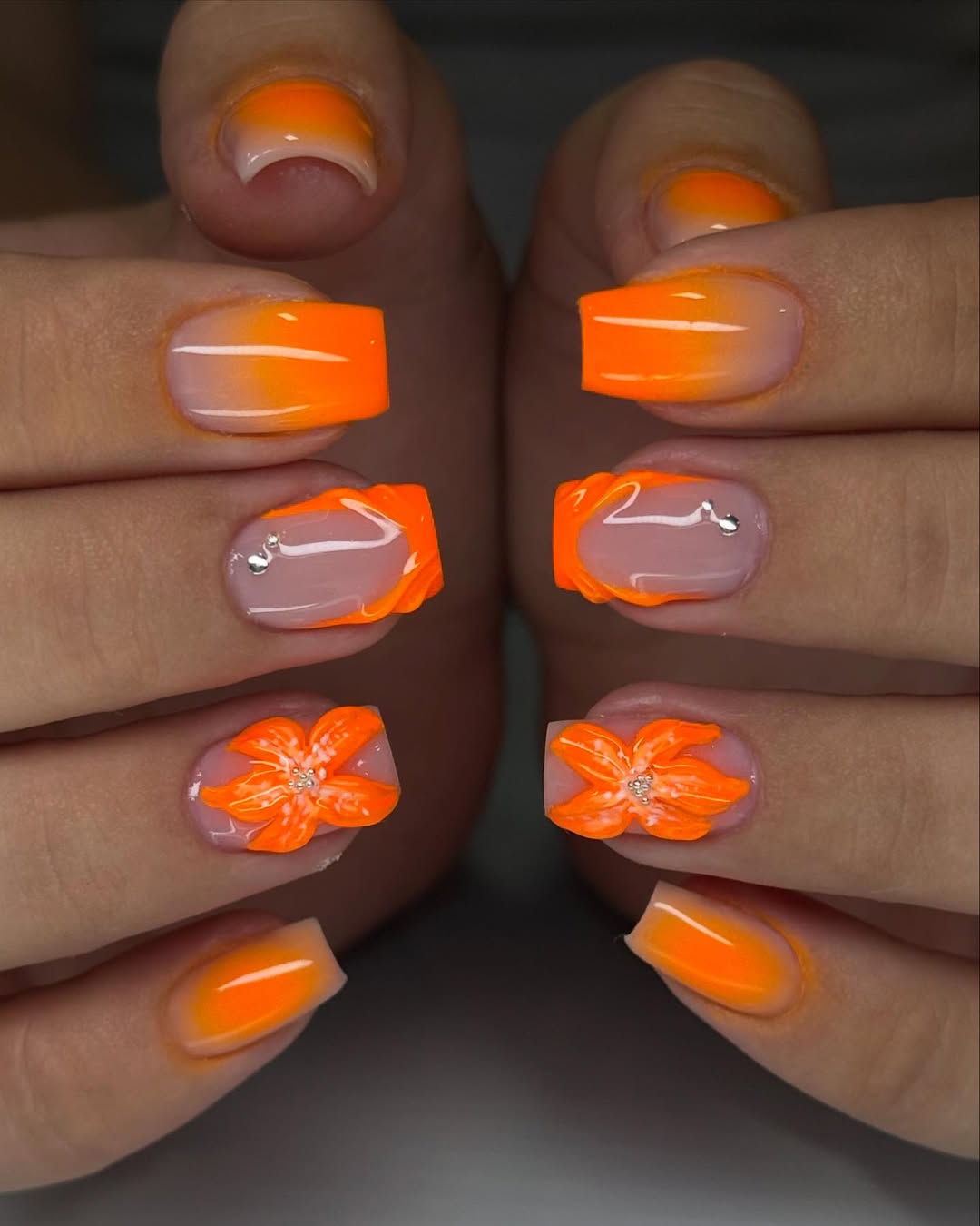 Vivid Orange Ombré Coffin Nails With 3D Floral Accents