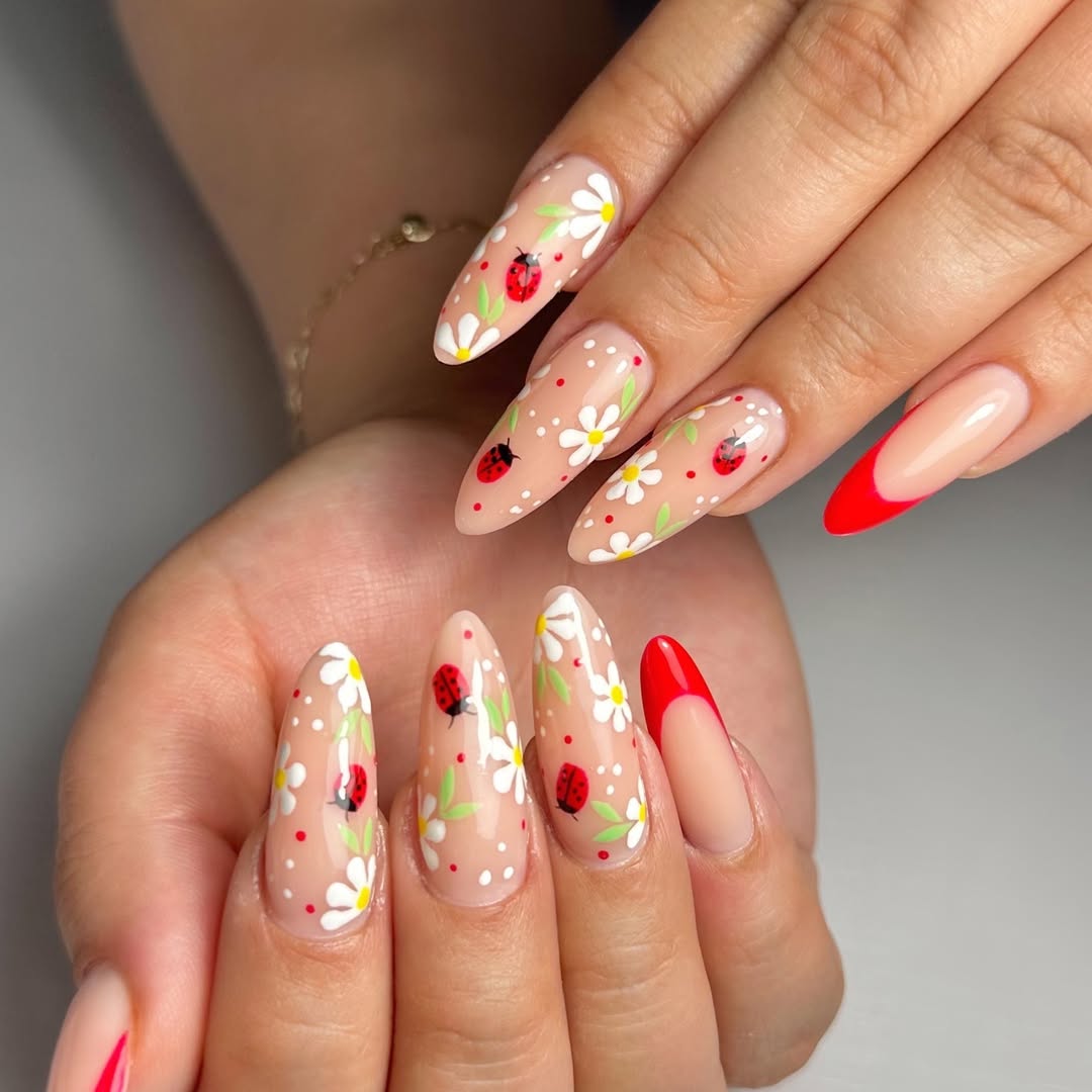 Whimsical Daisy Ladybug Almond Nails With Bright Red Tips