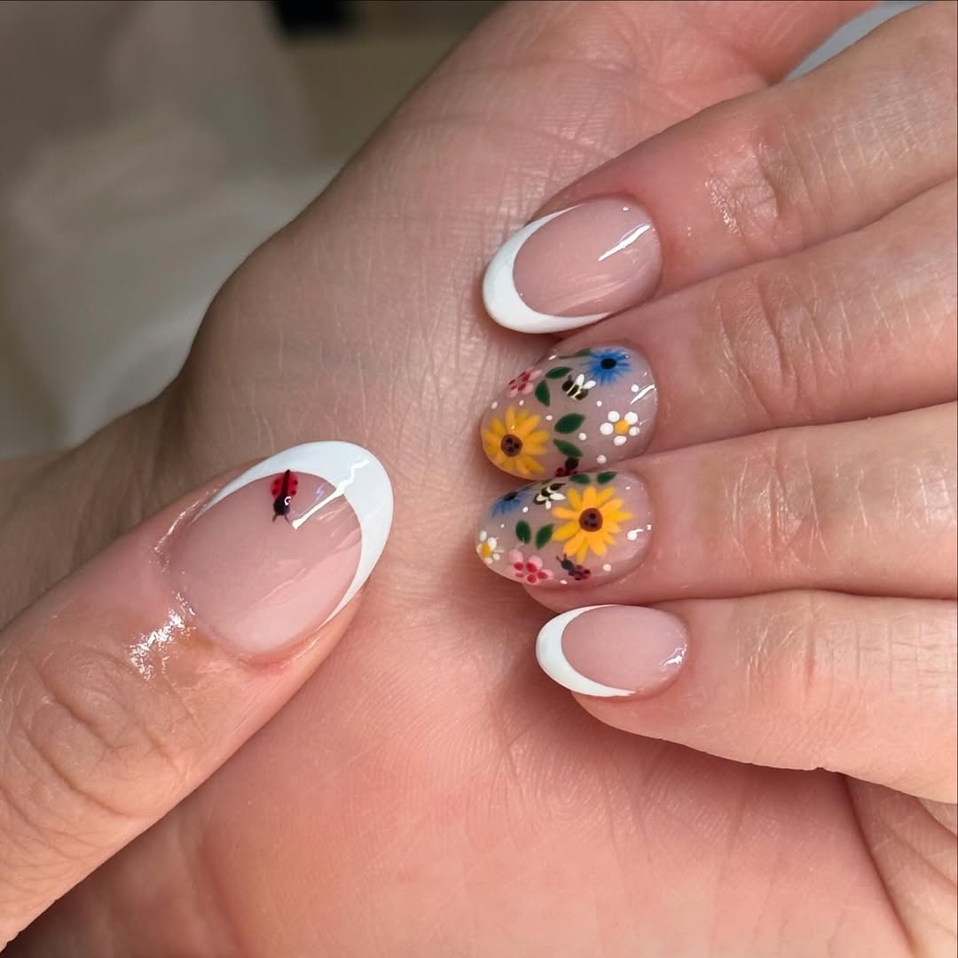 Whimsical Floral And Ladybug French Tip Short Nails