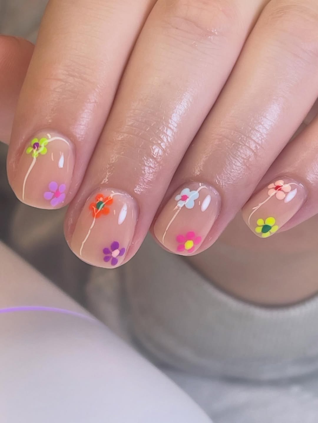 Whimsical Pastel Flowers On Sheer Nude Short Squoval
