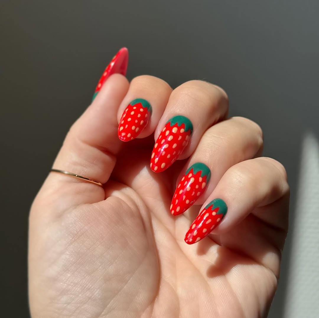 Whimsical Strawberry Red and Green Almond Nails
