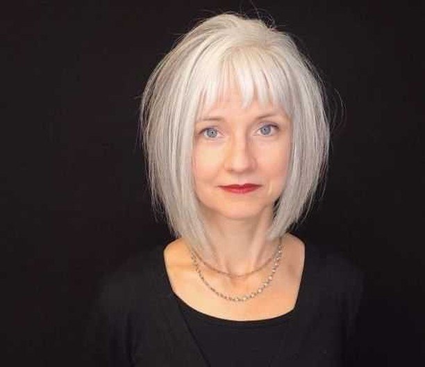 25 Stunning Hairstyles for Older Women in 2026 15 Ageless Silver Bob With Wispy Bangs