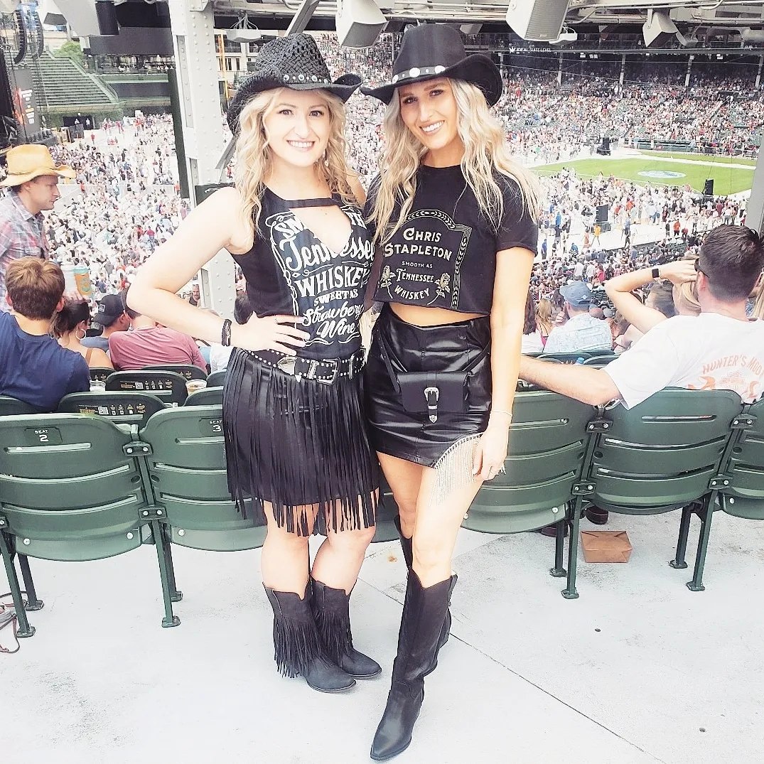 25 Cowboy Boot Outfits You Need for 2026 26 All Black Fringe And Leather Concert Outfit