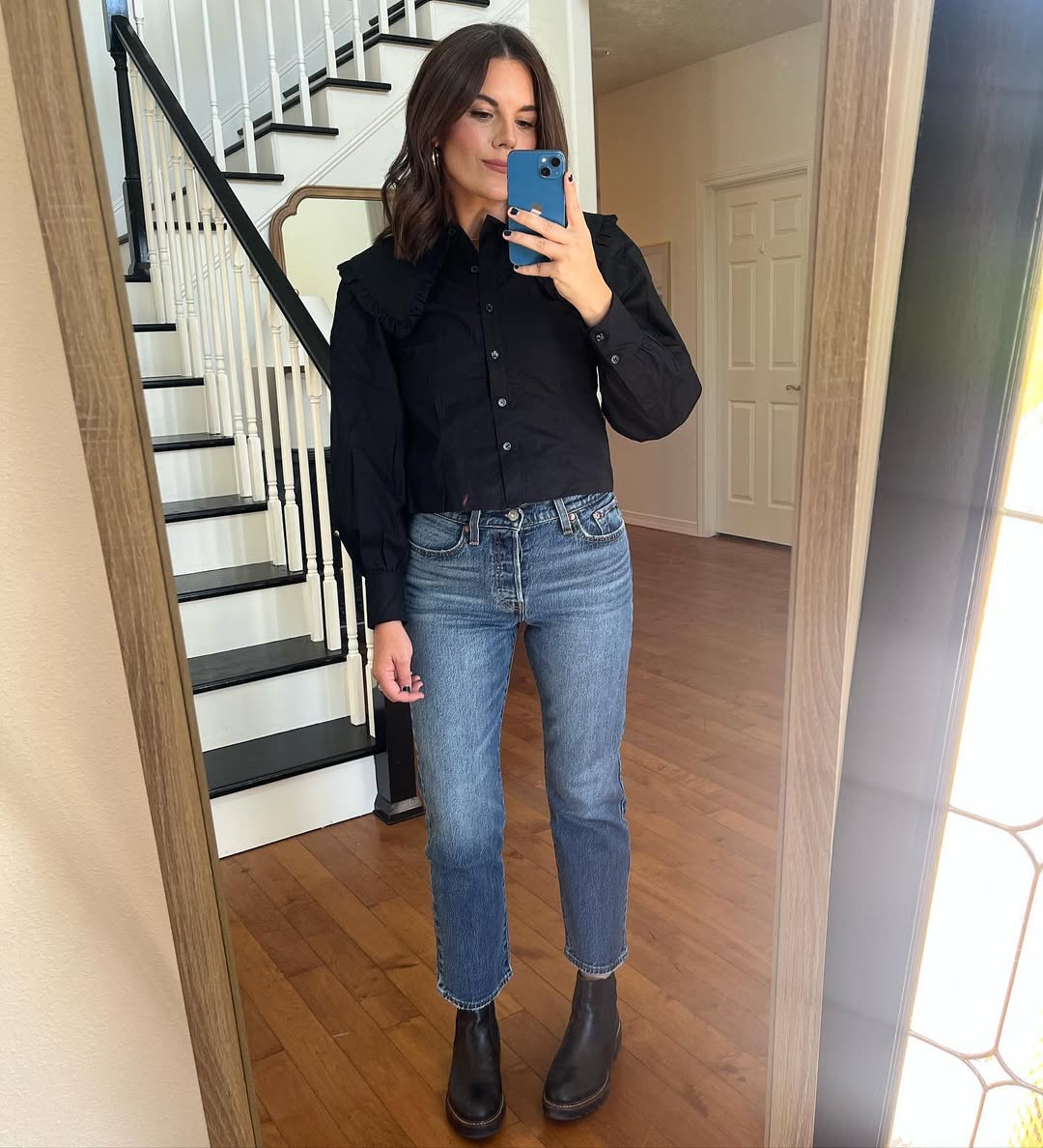 Black Statement Collar Top and High-Waisted Denim