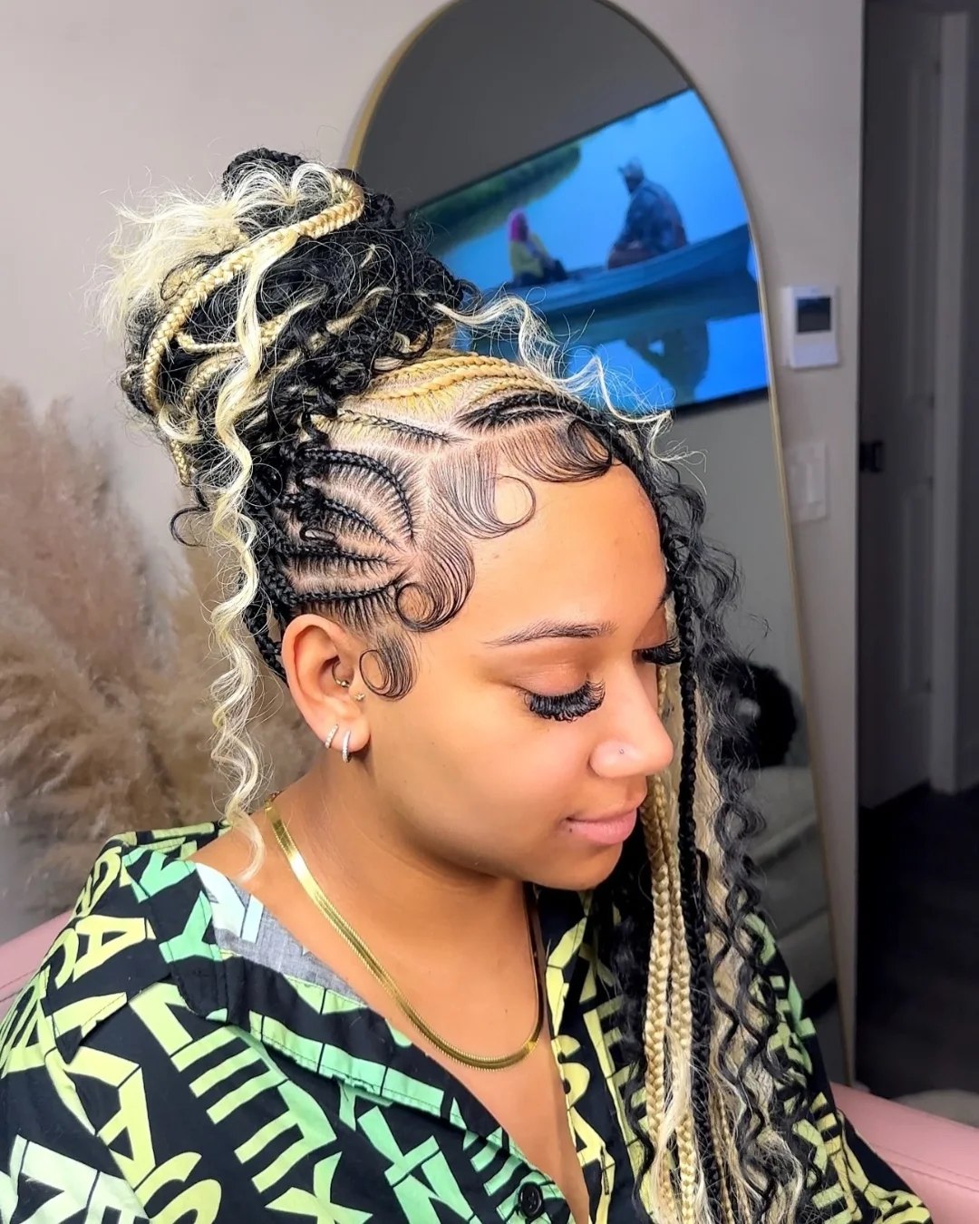 Blonde and Black Braided Updo With Curly Ends
