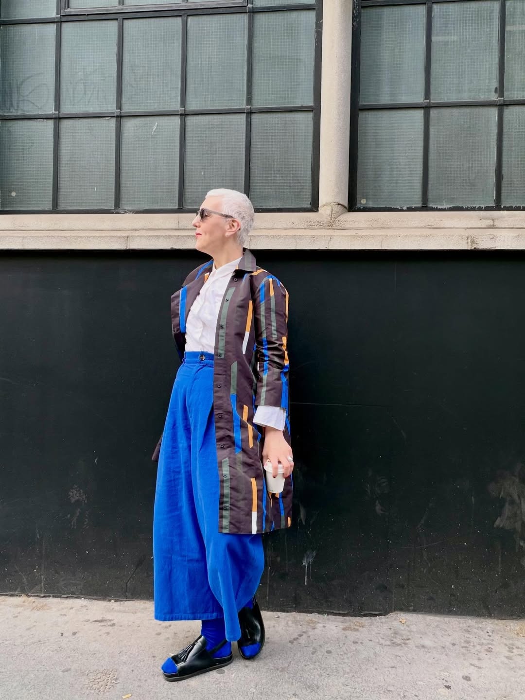 29 Work Outfits You Need for 2026 Trends 13 Bold Blue Wide-Leg Trousers With Striped Duster Coat
