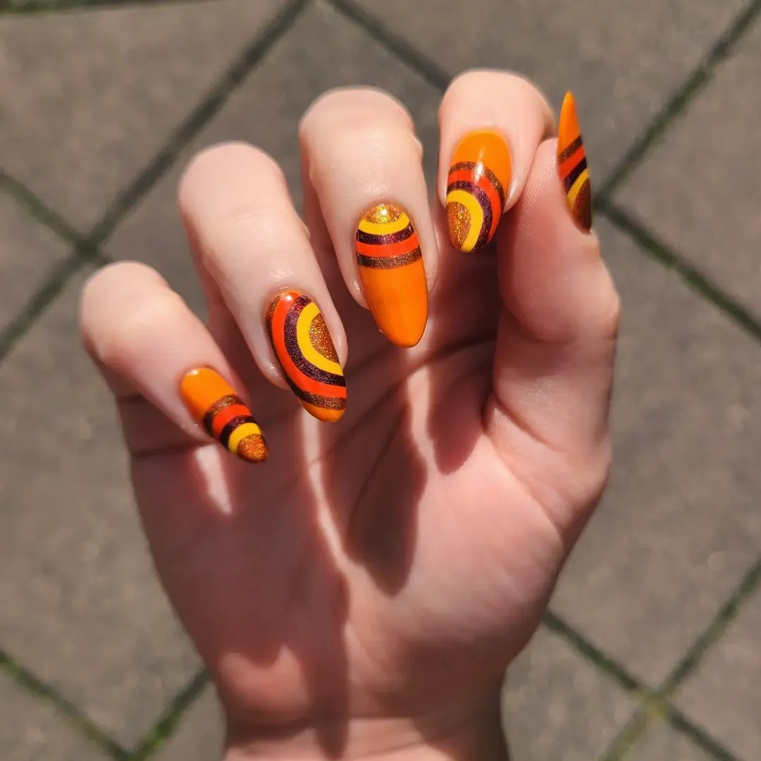 Bold Orange Gold Glitter Geometric Long Almond Nails