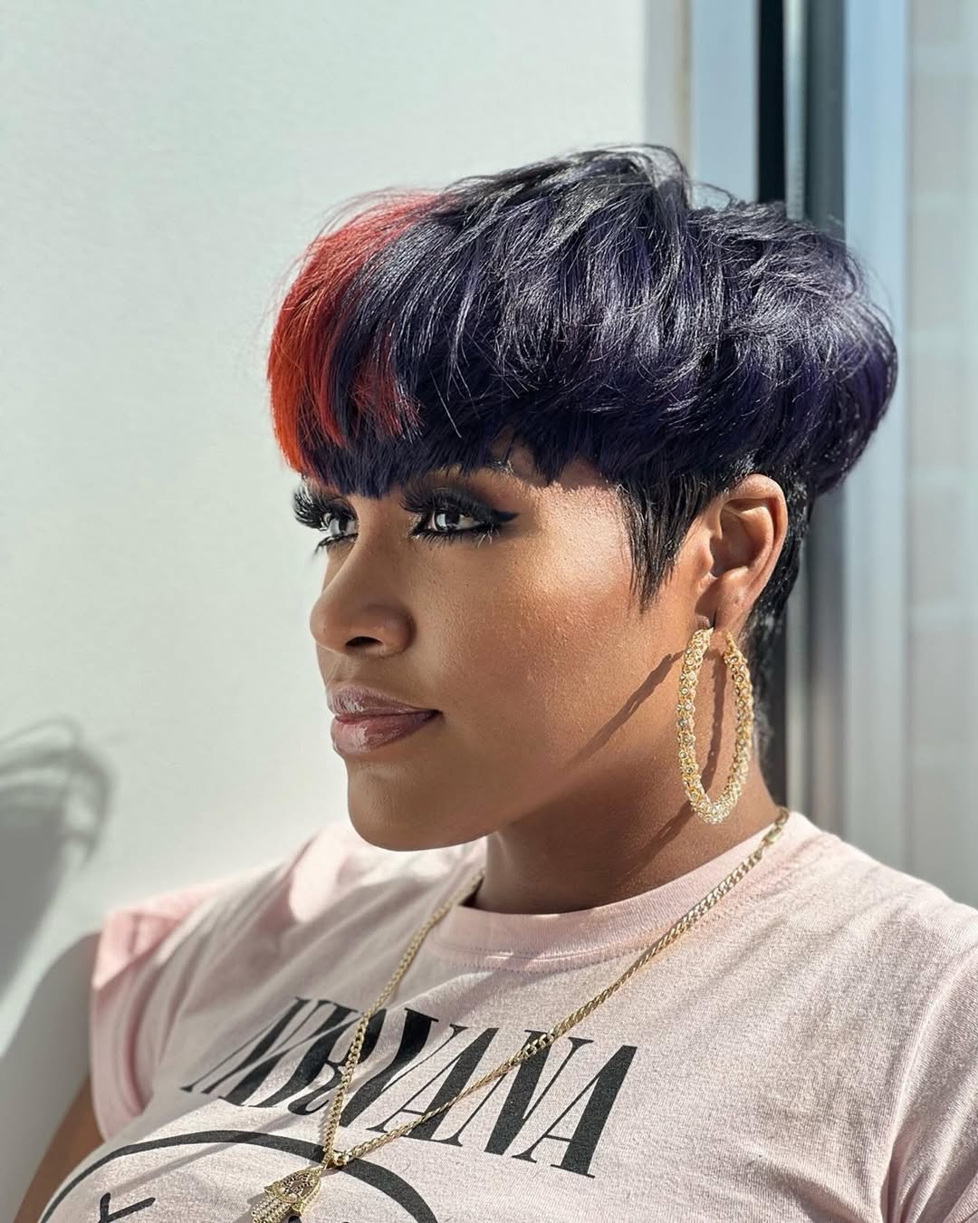 Bold Pixie With Purple And Red Accents
