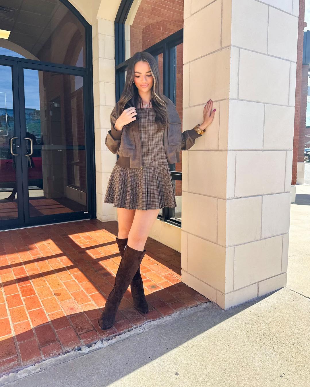 25 Fall Dress Outfits You Need For 2026 18 Brown Plaid Mini Dress With Suede Boots