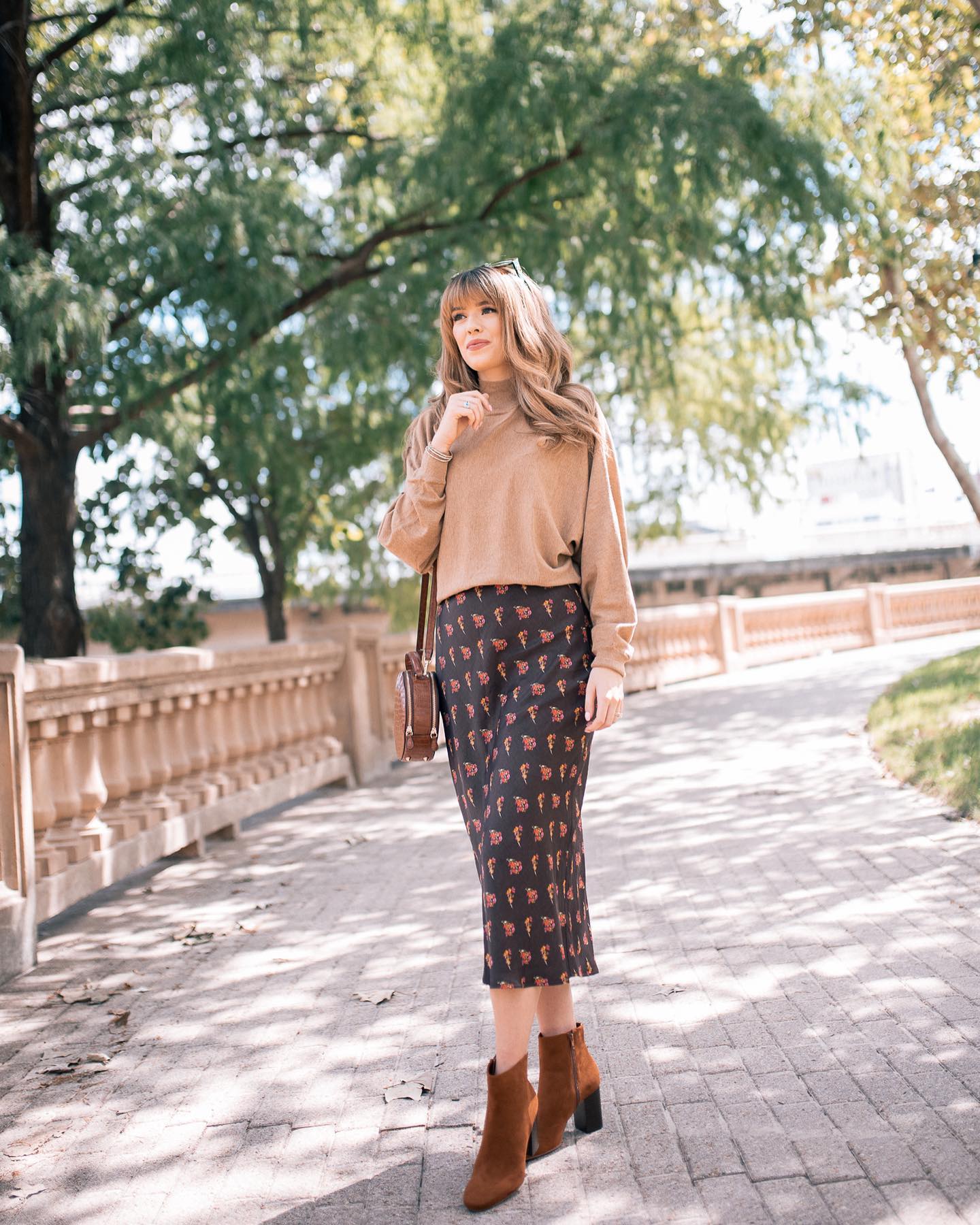 29 Chic Fall Skirt Outfits You Need for 2026 12 Brown Suede Booties And Floral Midi Skirt
