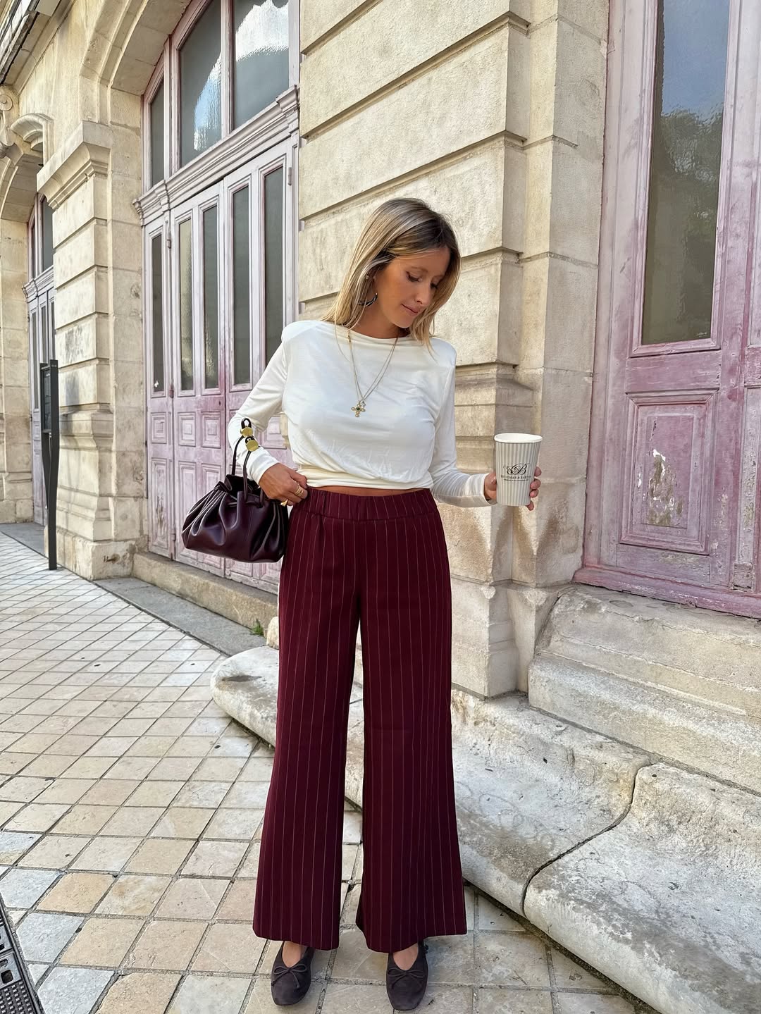 29 Work Outfits You Need for 2026 Trends 12 Burgundy Pinstripe Wide Leg Trousers With Cream Top