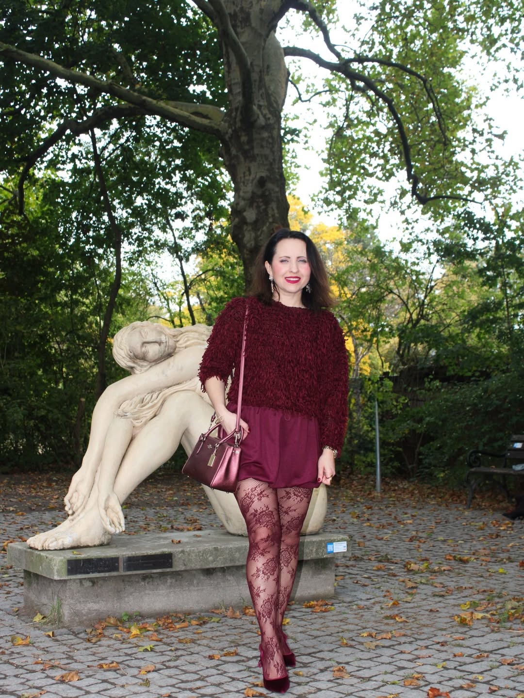 25 Dress with Tights Trends You Must See for 2026 18 Burgundy Textured Knit With Satin Skirt And Lace Tights