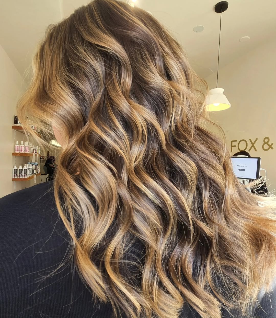 Caramel Blonde Balayage Waves with Lived-In Depth