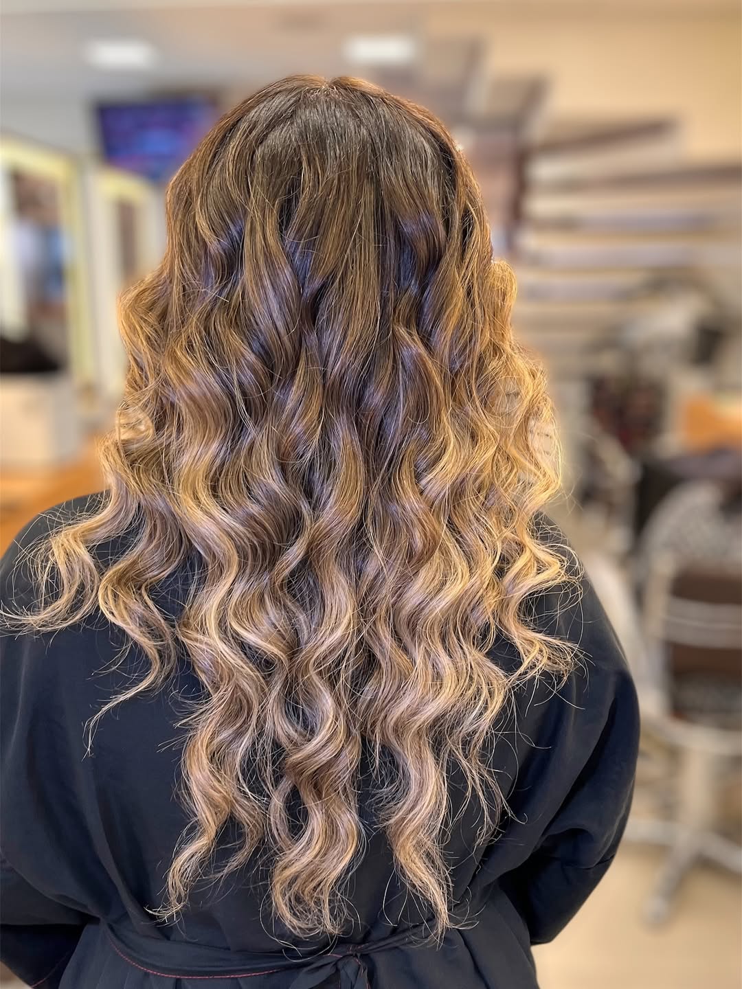 Caramel Blonde Balayage With Voluminous Curls