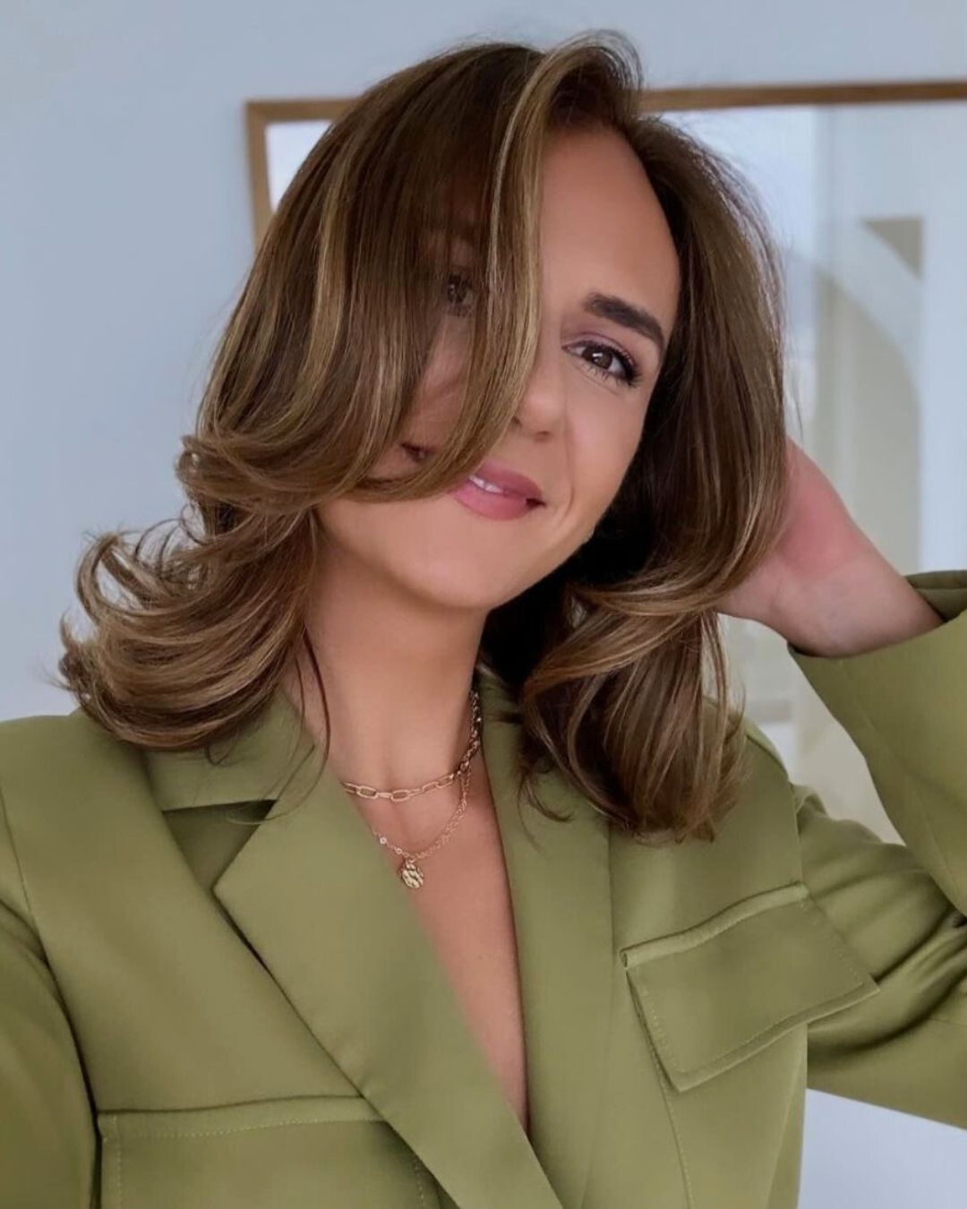 Caramel Blonde Face-Framing Layers Medium Length Blowout