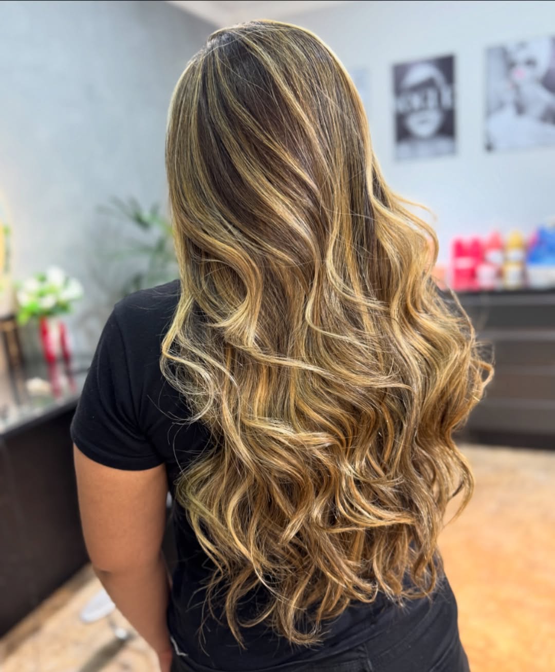 Caramel Blonde Highlights On Flowing Mid-Back Waves
