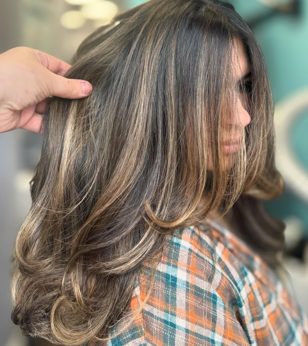 Caramel Ribbon Highlights On Voluminous Mid-Length Layers