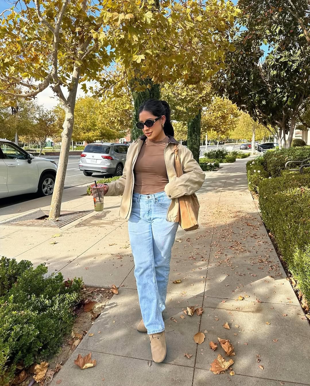 30 Chic Fall Outfits Women Will Love in 2026 8 Casual Tan Jacket With Brown Top And Jeans