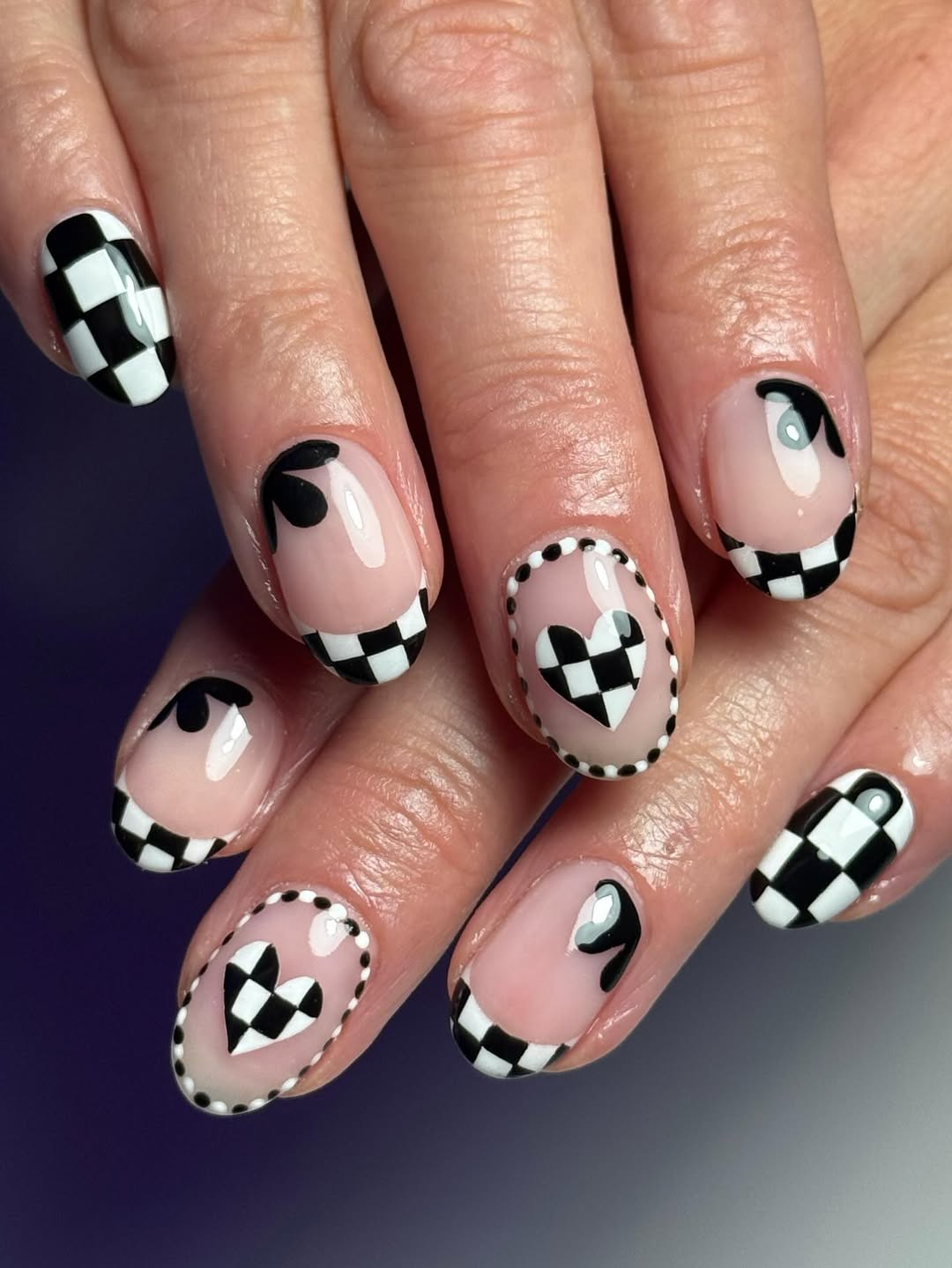 29 Checkerboard Nail Ideas for 2026 21 Checkerboard French Tips with Heart Accents