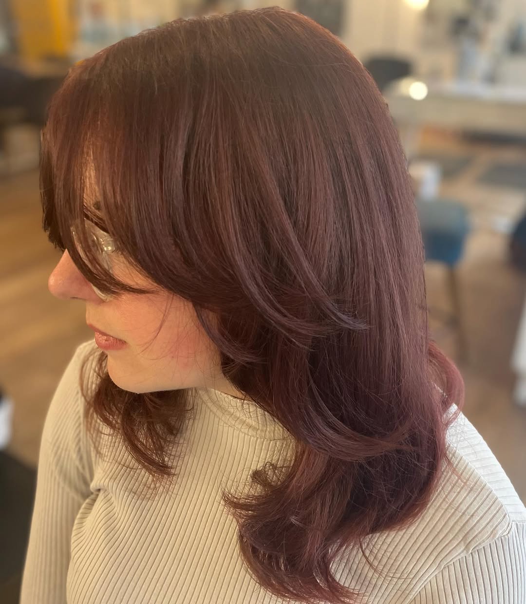 Cherry Brown Layers With Face Framing Bangs
