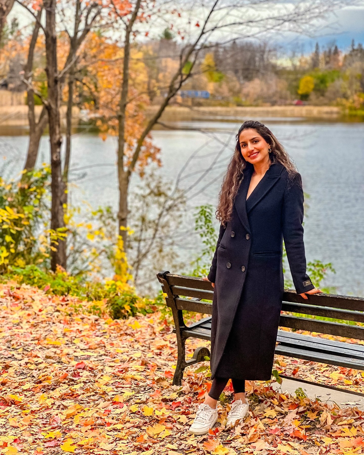 25 Fall Going Out Outfits You Need for 2026 16 Chic Black Coat With Sneakers Autumn Stroll