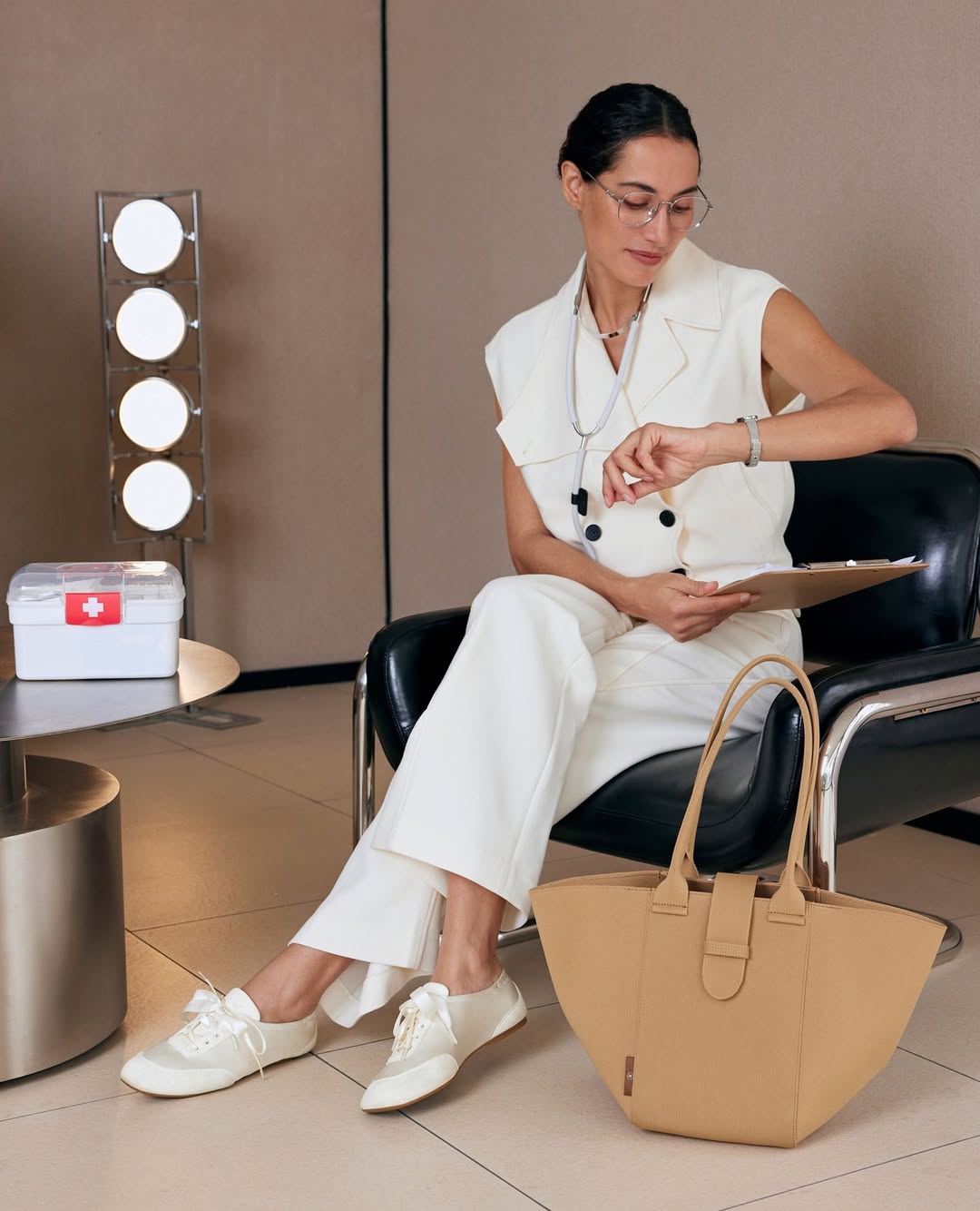 29 Work Outfits You Need for 2026 Trends 15 Chic White Sleeveless Vest Suit With Tan Tote