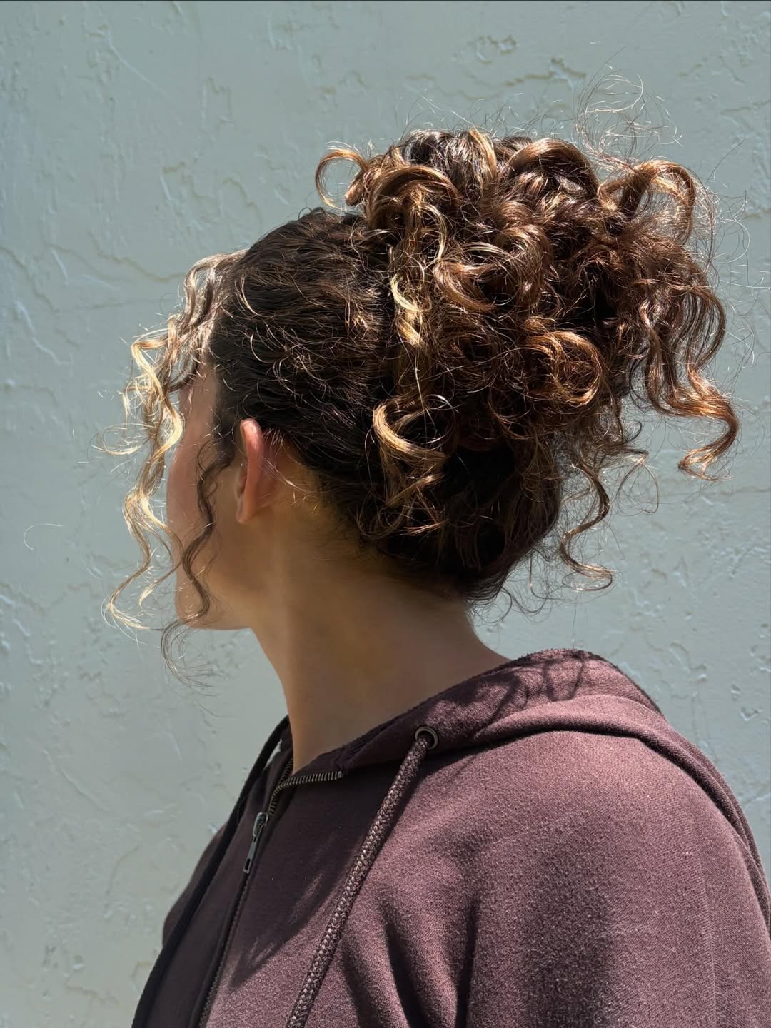 Choppy Curly Textured Medium Updo